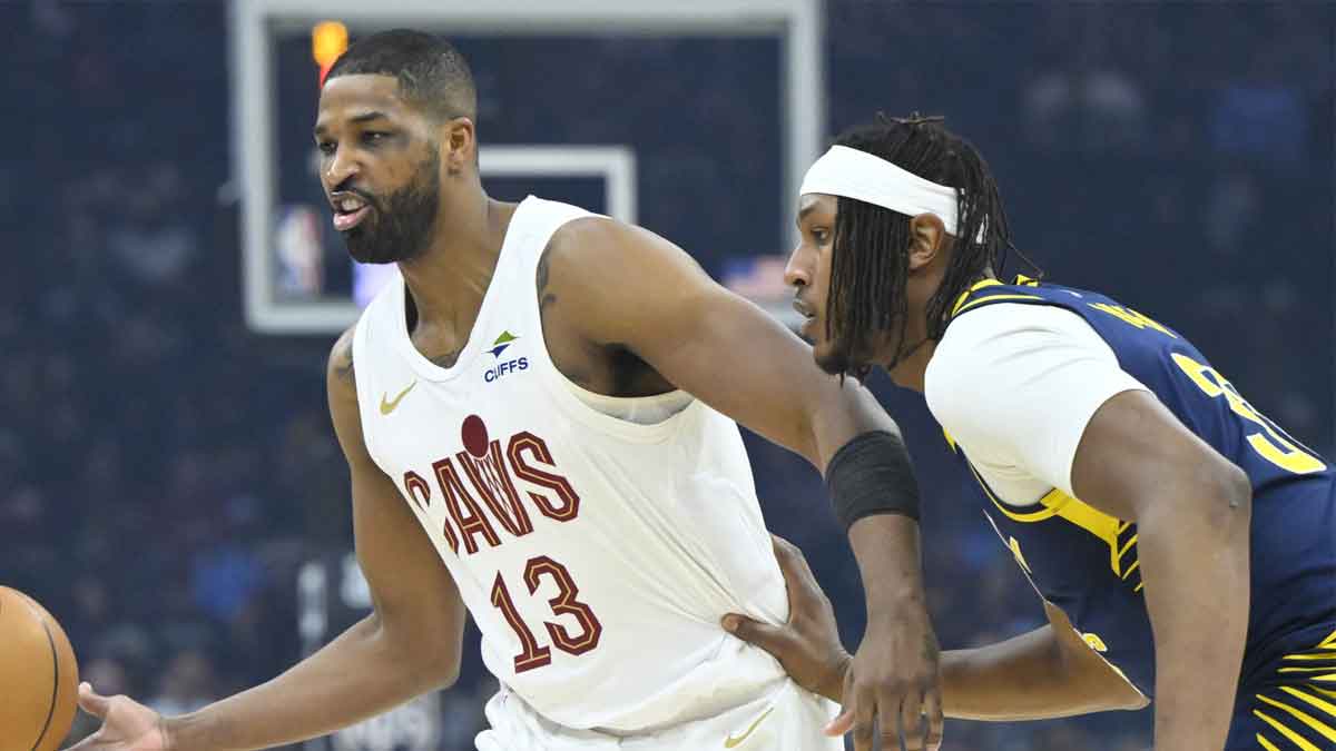 Cleveland Cavaliers center Tristan Thompson (13) passes the ball beside Indiana Pacers center Myles Turner (33) in the first quarter at Rocket Arena.