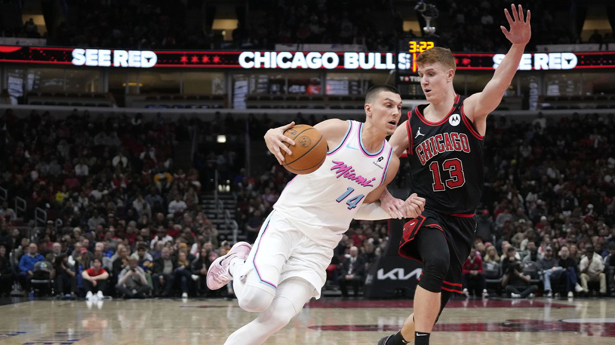 Chicago Bulls guard Kevin Huerter (13) defends Miami Heat guard Tyler Herro (14) during the second half at United Center. 