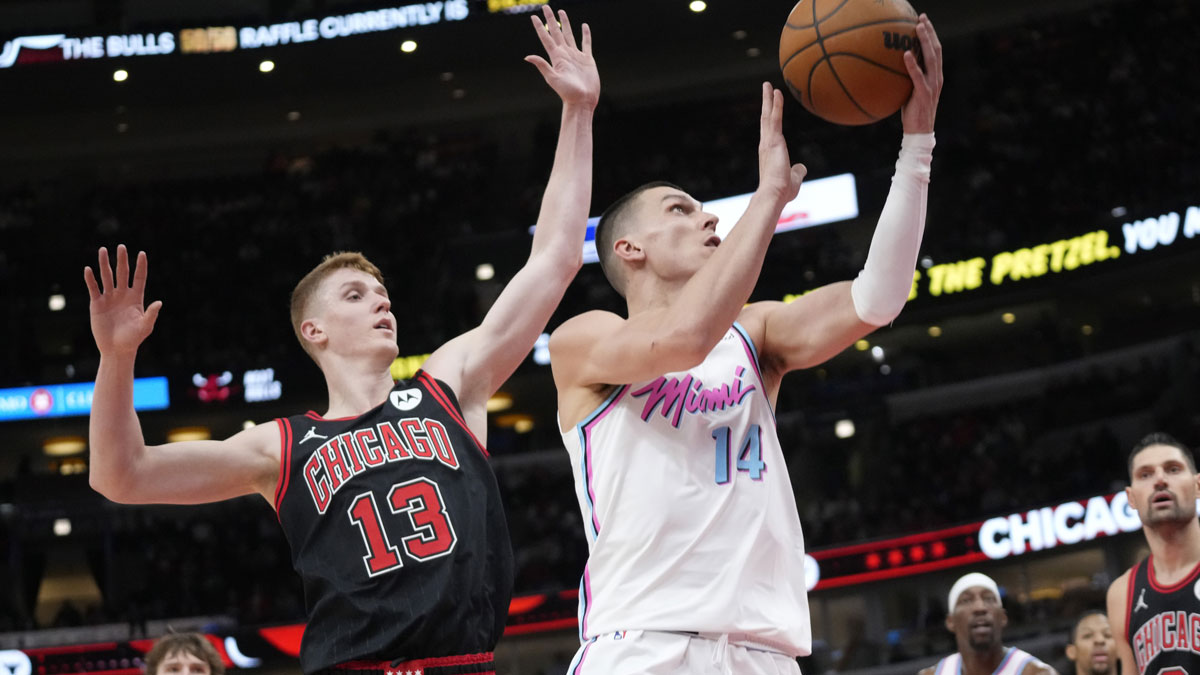 Chicago Bulls guard Kevin Huerter (13) defends Miami Heat guard Tyler Herro (14) during the second half at United Center.