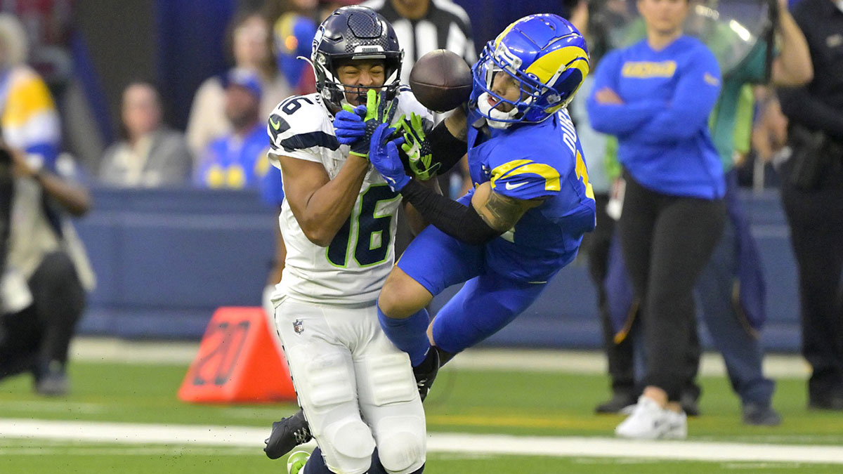 Los Angeles Rams cornerback Cobie Durant (14) breaks up a pass for Seattle Seahawks wide receiver Tyler Lockett (16) in the second half against at SoFi Stadium. Mandatory Credit: Jayne Kamin-Oncea-Imagn Images
