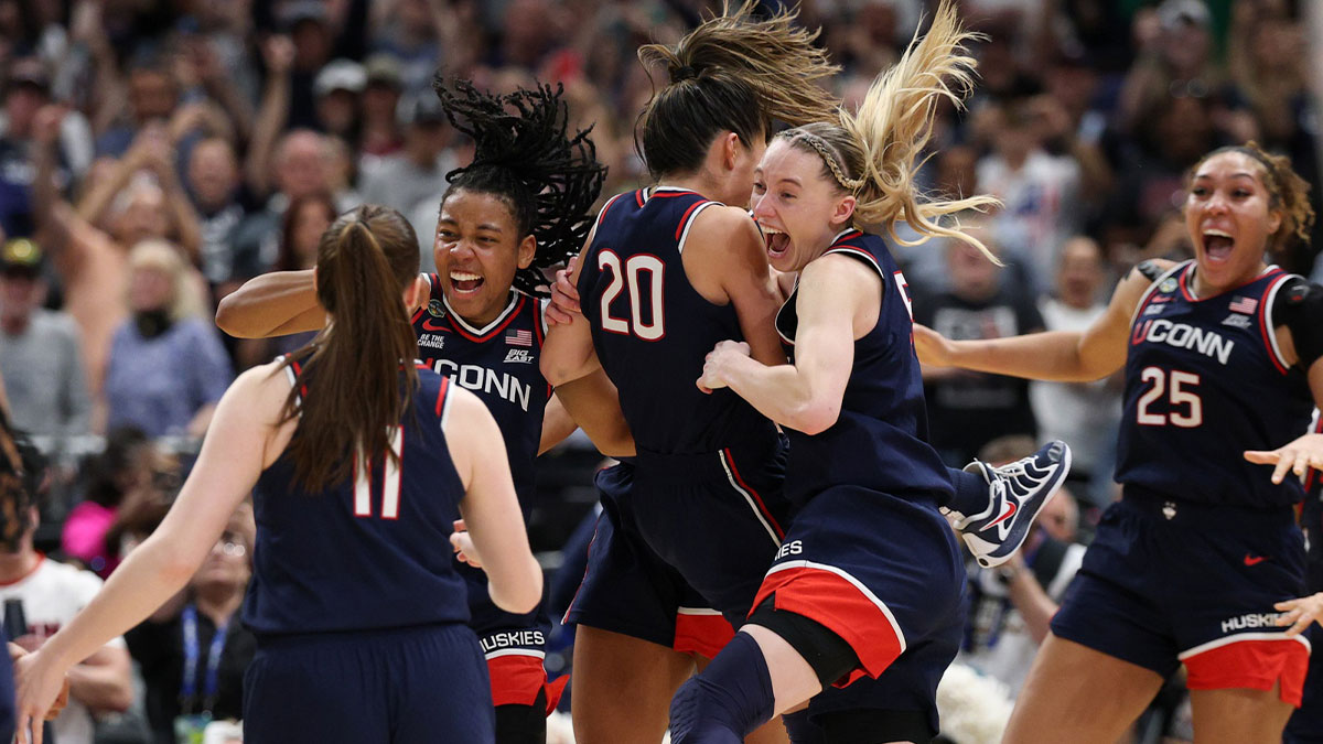 The Connecticut (UConn) Huskies celebrate winning the national championship of the women's 2025 NCAA tournament against the South Carolina Gamecocks at Amalie Arena.