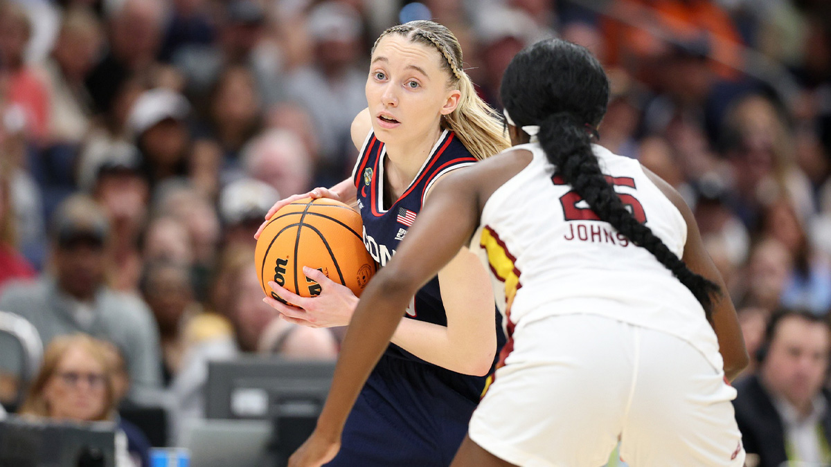 UConn Huskies and probable Dallas Wings guard Paige Bueckers has the ball against South Carolina Gamecocks guard Raven Johnson during the first half of the national championship of the women's 2025 NCAA tournament at Amalie Arena.