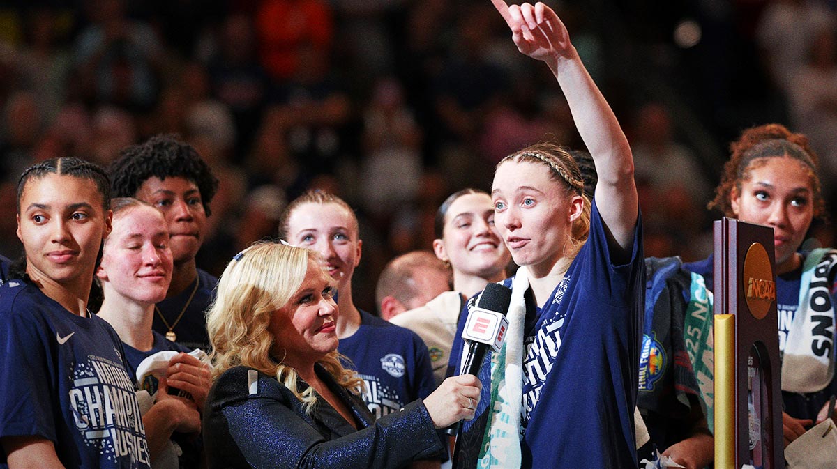 UConn women's basketball guard Paige Bueckers (5) is interviewed by ESPN reporter Holly Rowe after the national championship of the women's 2025 NCAA tournament against the South Carolina Gamecocks at Amalie Arena.