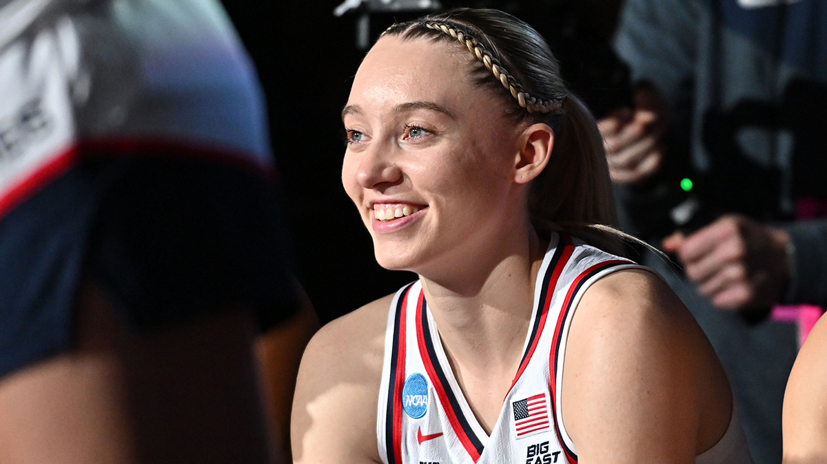 UConn Huskies guard Paige Bueckers (5) looks on during a Sweet 16 NCAA Tournament basketball game against the Oklahoma Sooners.
