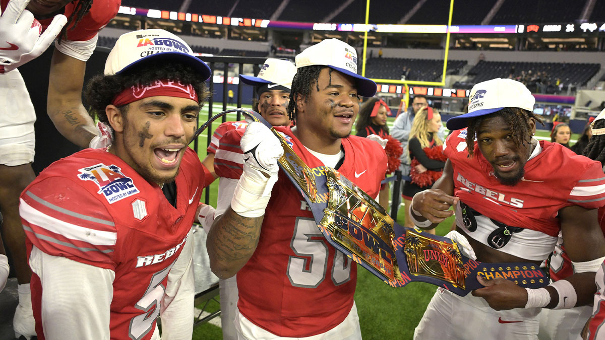 The UNLV Rebels celebrate after defeating the California Golden Bears in the LA Bowl at SoFi Stadium. Mandatory Credit: Jayne Kamin-Oncea-Imagn Images