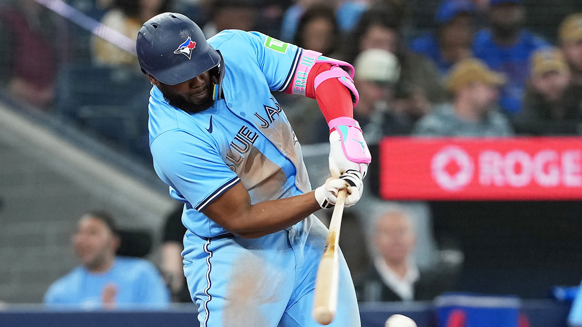 Toronto Blue Jays first baseman Vladimir Guerrero Jr. (27) hits an RBI fielder choice scoring a run against the Washington Nationals during the sixth inning at Rogers Centre.