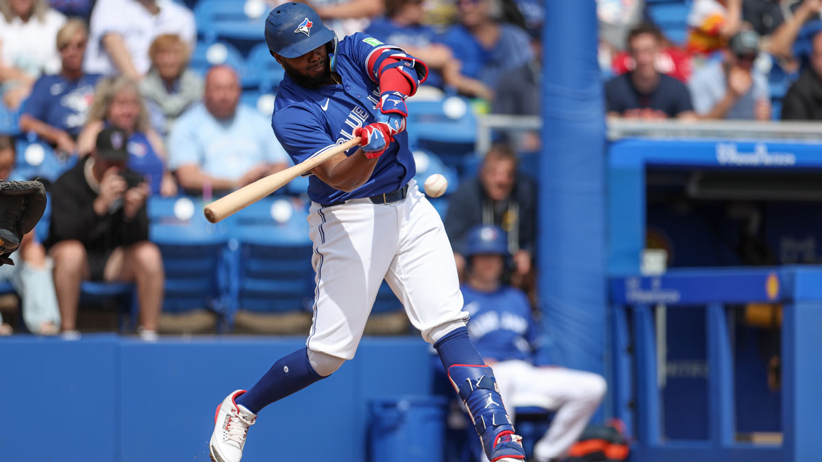 Toronto Blue Jays first baseman Vladimir Guerrero Jr. (27) singles against the Houston Astros in the fifth inning during spring training at TD Ballpark.