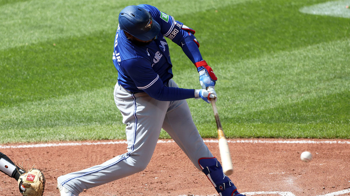 Toronto Blue Jays first baseman Vladimir Guerrero Jr. (27) hits a single during the fifth inning against the Baltimore Orioles at Oriole Park at Camden Yards