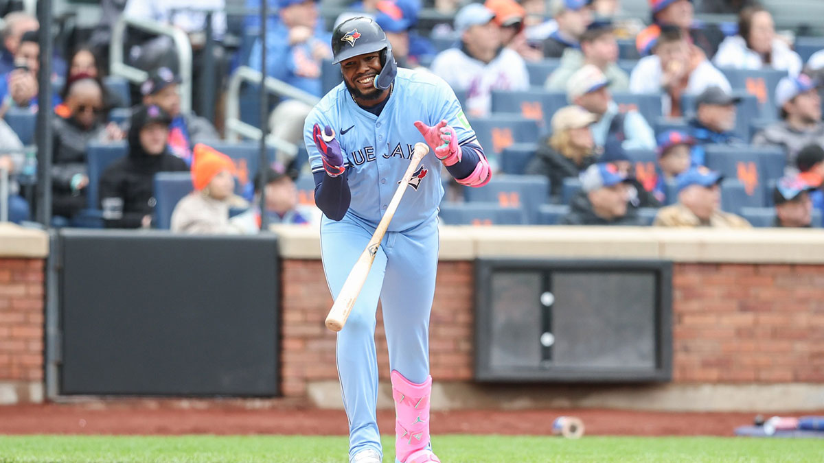 Toronto Blue Jays first baseman Vladimir Guerrero Jr. (27) flips his bat after flying out in the third inning against the New York Mets at Citi Field.