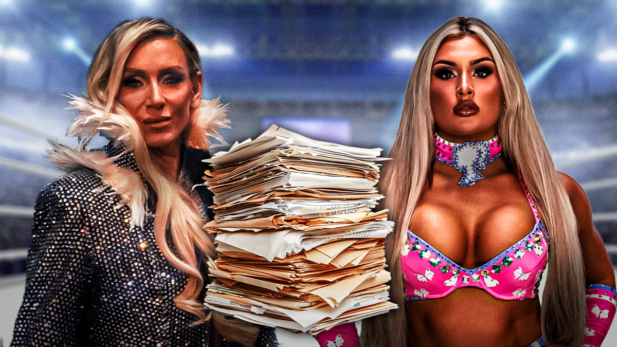 WWE stars Charlotte Flair and Tiffany Stratton, who went off-script with their promo, with a stack of paper.