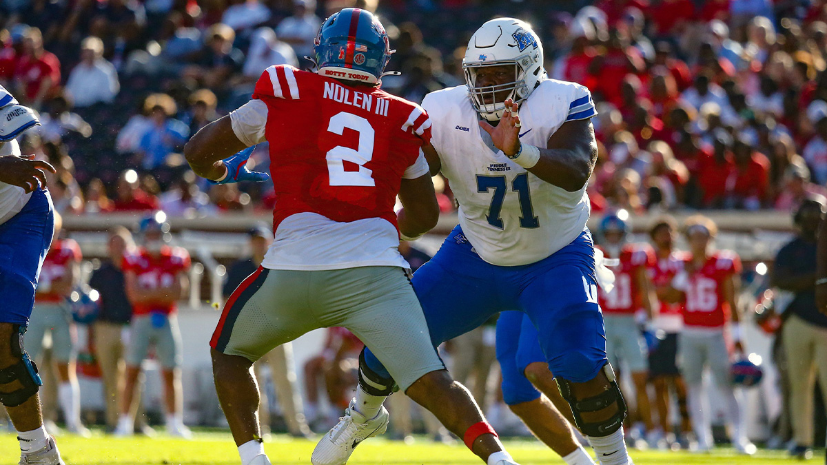 Middle Tennessee Blue Raiders offensive linemen Ellis Adams (71) blocks Mississippi Rebels defensive linemen Walter Nolen (2) during the second half at Vaught-Hemingway Stadium.