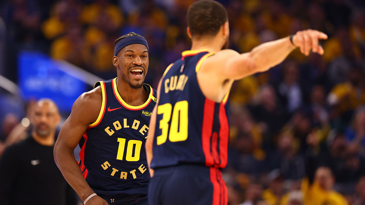 Warriors forward Jimmy Butler III (10) celebrates towards guard Stephen Curry (30) after a basket against the Houston Rockets during the first quarter of game four of the 2025 NBA Playoffs first round at Chase Center