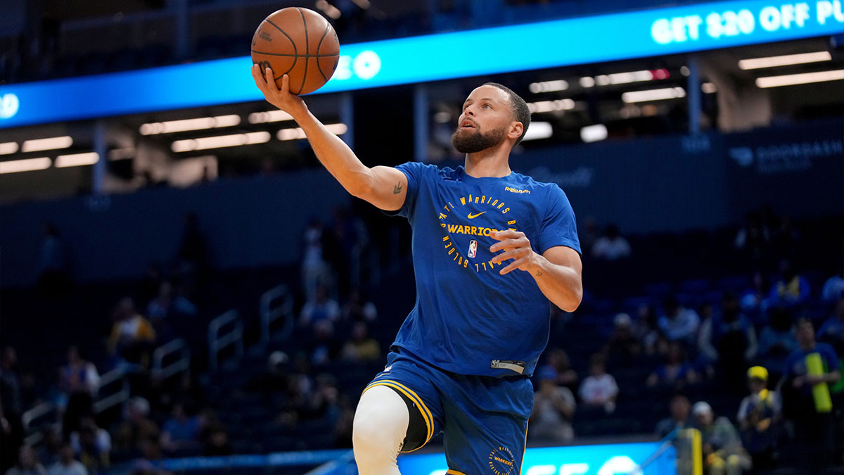Golden State Warriors guard Stephen Curry (30) warms up before the start of the game against the Houston Rockets at the Chase Center.