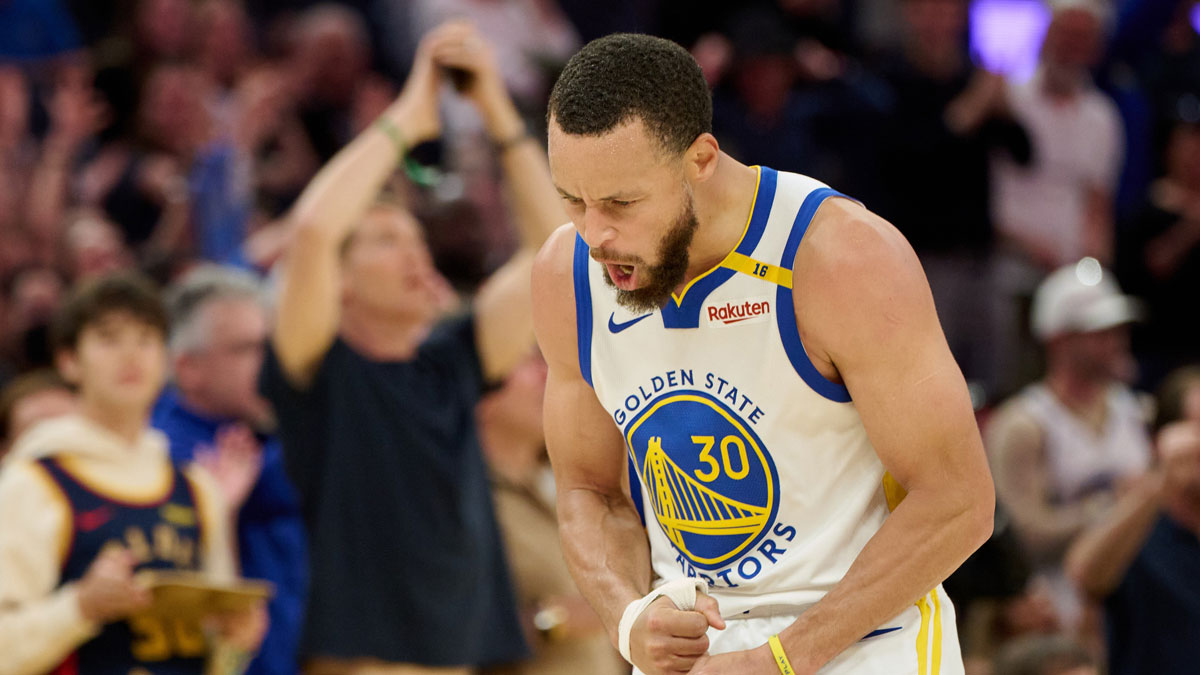 Golden State Warriors guard Stephen Curry (30) reacts after making a three-point shot against the LA Clippers during the fourth quarter at Chase Center.