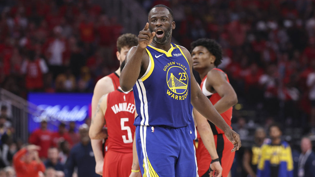 Warriors forward Draymond Green (23) reacts after a call during the fourth quarter during game two of the first round for the 2024 NBA Playoffs against the Houston Rockets at Toyota Center next to Warriors' Jimmy Butler