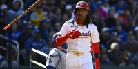 Washington Nationals shortstop CJ Abrams (5) flips his bat after hitting a solo home run against the Los Angeles Dodgers during the first inning at Nationals Park.
