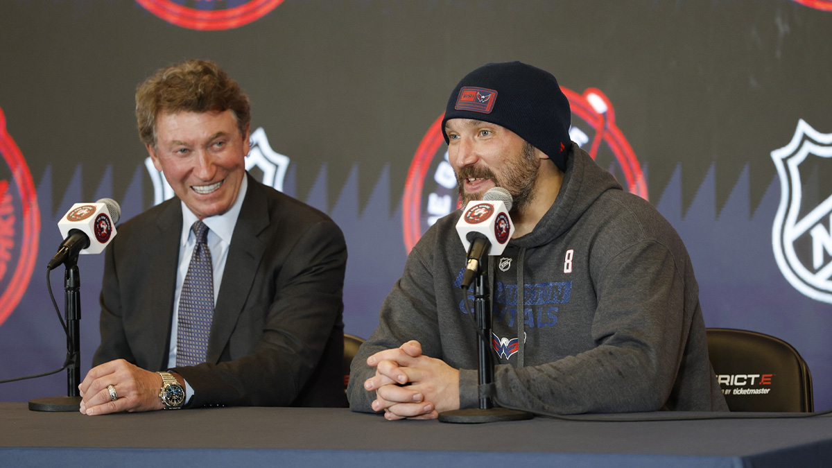 Washington Capitals left wing Alex Ovechkin (right) speaks at a press conference with Wayne Gretzky after the game against the Chicago Blackhawks at Capital One Arena. Ovechkin scored the 893rd and 894th goals of his career, tying Gretzky for most all-time goals in NHL history.