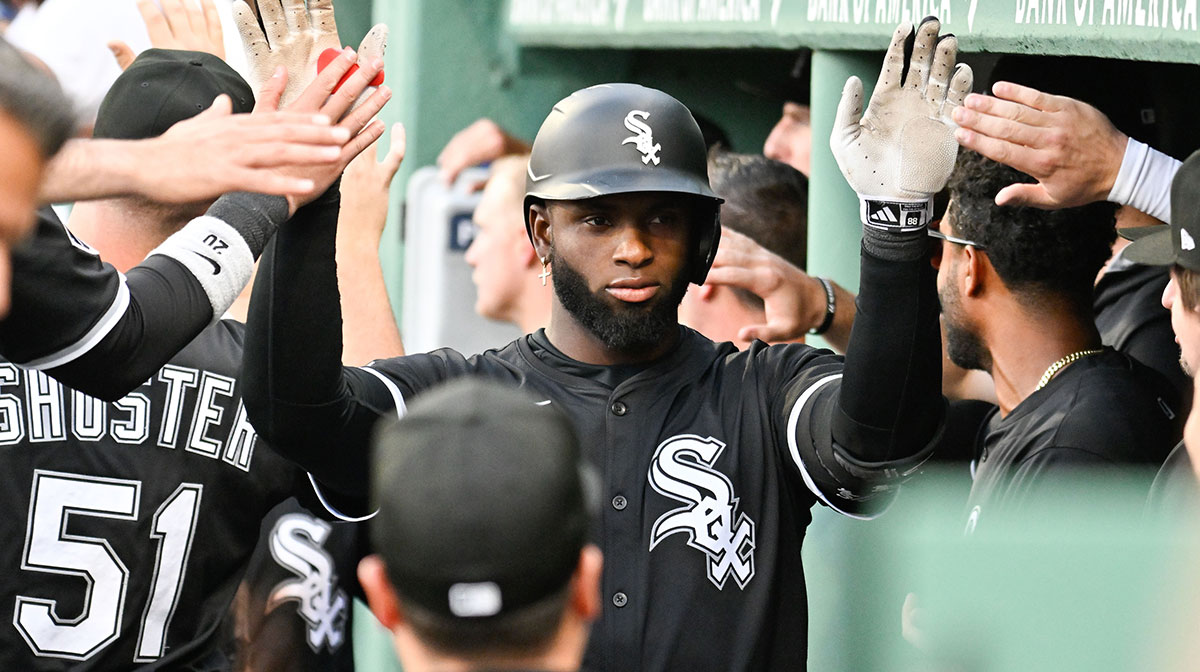 Chicago White Sox center fielder Luis Robert Jr. (88) celebrates his two-run home run during the seventh inning against the Boston Red Sox at Fenway Park.
