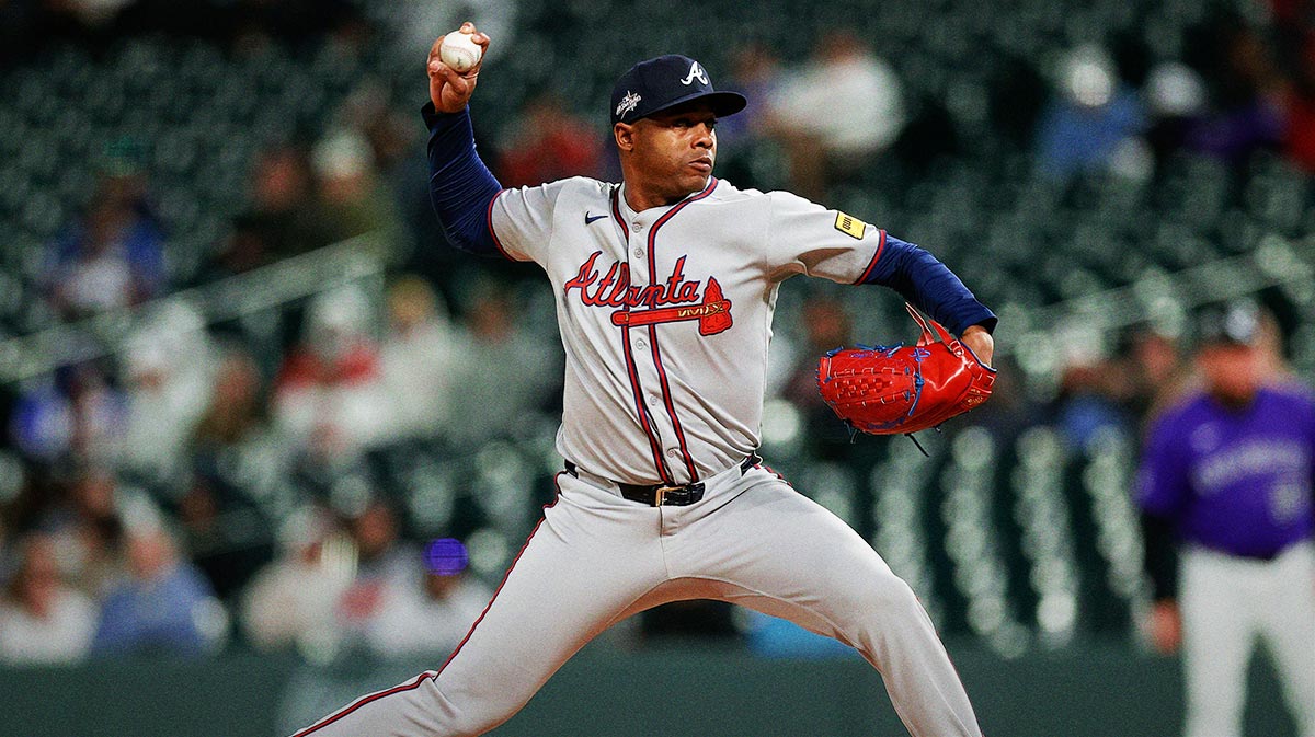 Atlanta Braves relief pitcher Raisel Iglesias (26) pitches in the ninth inning against the Colorado Rockies at Coors Field.