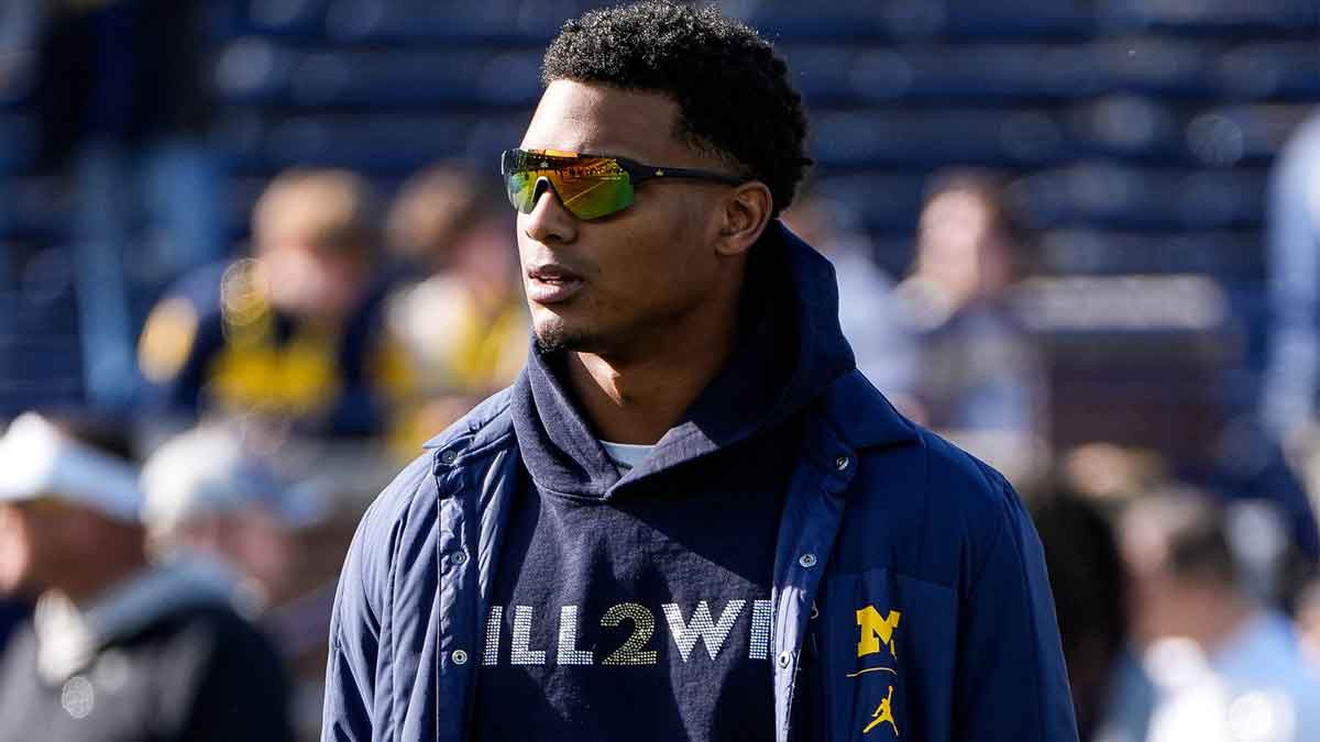 Michigan defensive back Will Johnson (2) watches warm up before the Oregon game at Michigan Stadium