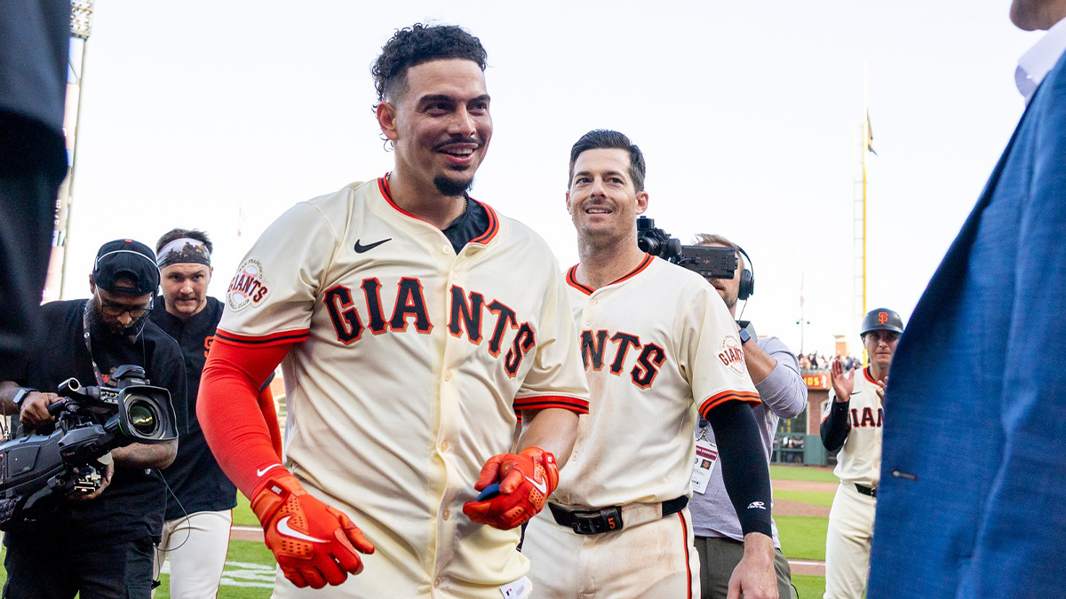 San Francisco Giants shortstop Willy Adames (2) celebrates after batting in the winning runs against the Seattle Mariners at Oracle Park.