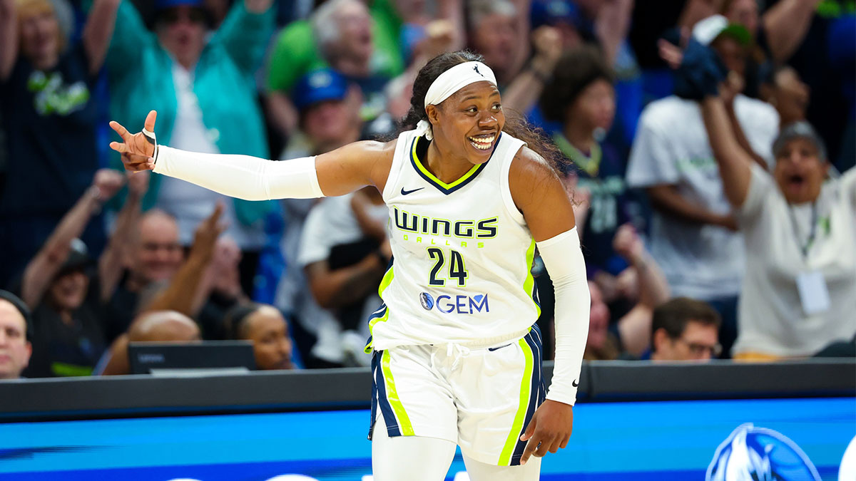 Wings star Arike Ogunbowale pulls up to training camp with an interesting accessory