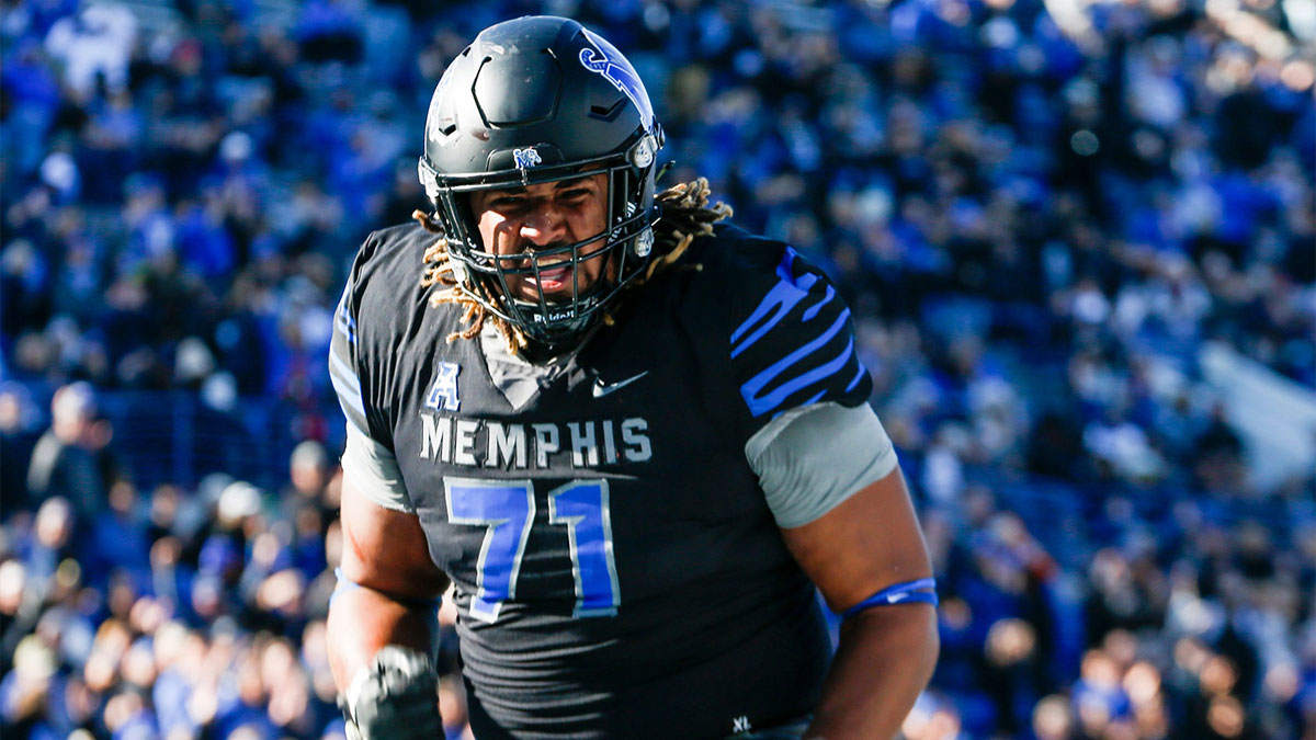 Memphis' Xavier Hill (71) celebrates after the team scored a touchdown during the game between Southern Methodist University and University of Memphis at Simmons Bank Liberty Stadium in Memphis, Tenn., on Saturday, November 18, 2023.