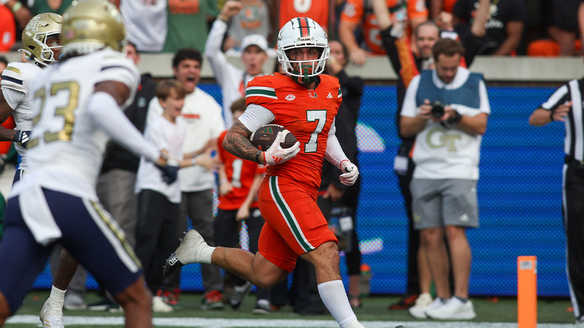 Miami Hurricanes wide receiver Xavier Restrepo (7) catches a pass for a touchdown against the Georgia Tech Yellow Jackets in the fourth quarter at Bobby Dodd Stadium at Hyundai Field.