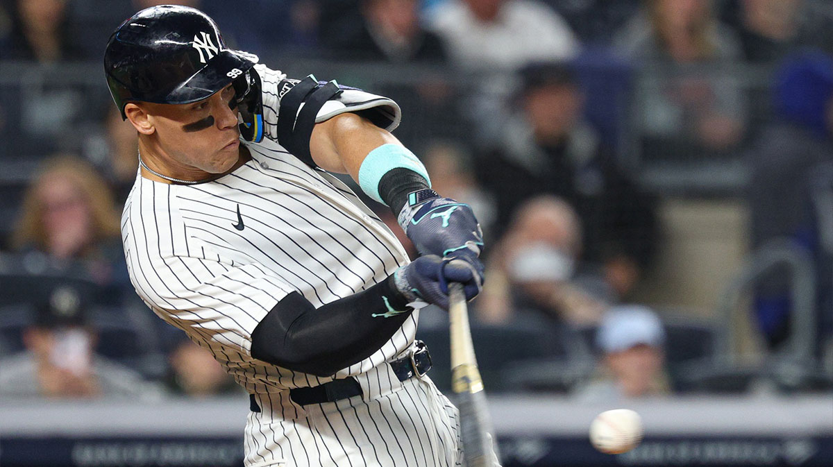 New York Yankees center fielder Aaron Judge (99) doubles during the sixth inning against the Arizona Diamondbacks at Yankee Stadium