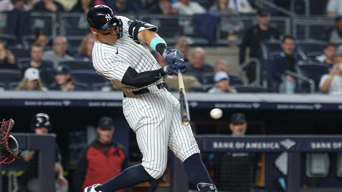 New York Yankees center fielder Aaron Judge (99) singles during the fourth inning against the Arizona Diamondbacks at Yankee Stadium.