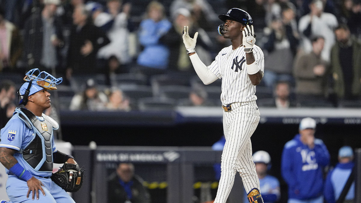 New York Yankees second baseman Jazz Chisholm Jr. (13) reacts to hitting a home run against the Kansas City Royals during the fourth inning at Yankee Stadium.