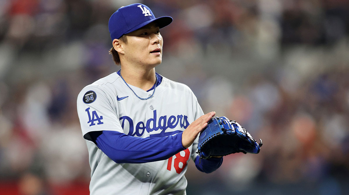 Apr 18, 2025; Arlington, Texas, USA; Los Angeles Dodgers pitcher Yoshinobu Yamamoto (18) reacts after an out during the fourth inning against the Texas Rangers at Globe Life Field. Mandatory Credit: Tim Heitman-Imagn Images