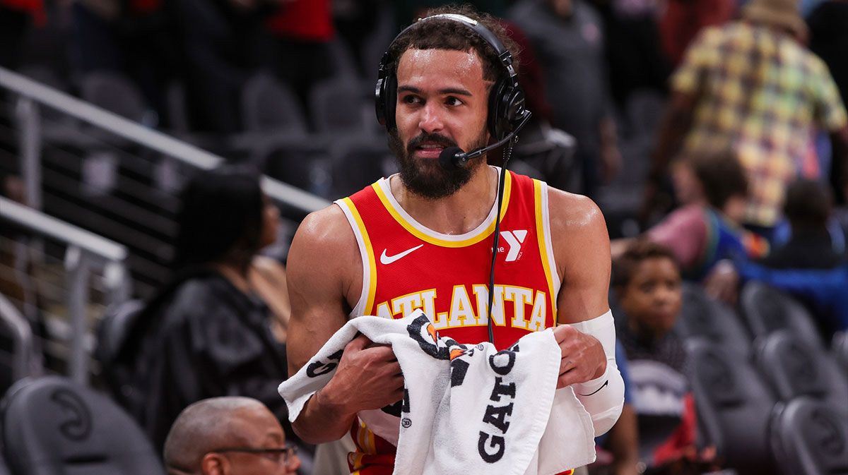 Atlanta Hawks guard Trae Young (11) does an interview after a victory over the Utah Jazz at State Farm Arena.