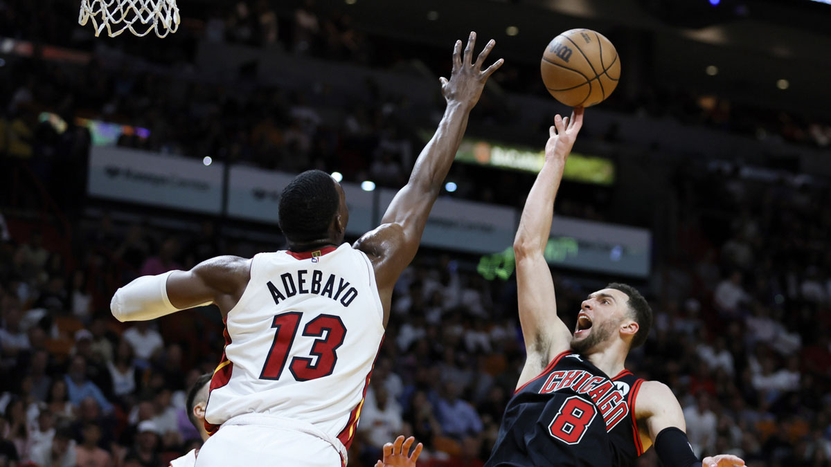Chicago Bulls guard Zach LaVine (8) shoots the basketball over basket Miami Heat center Bam Adebayo (13) during the third quarter at Kaseya Center.