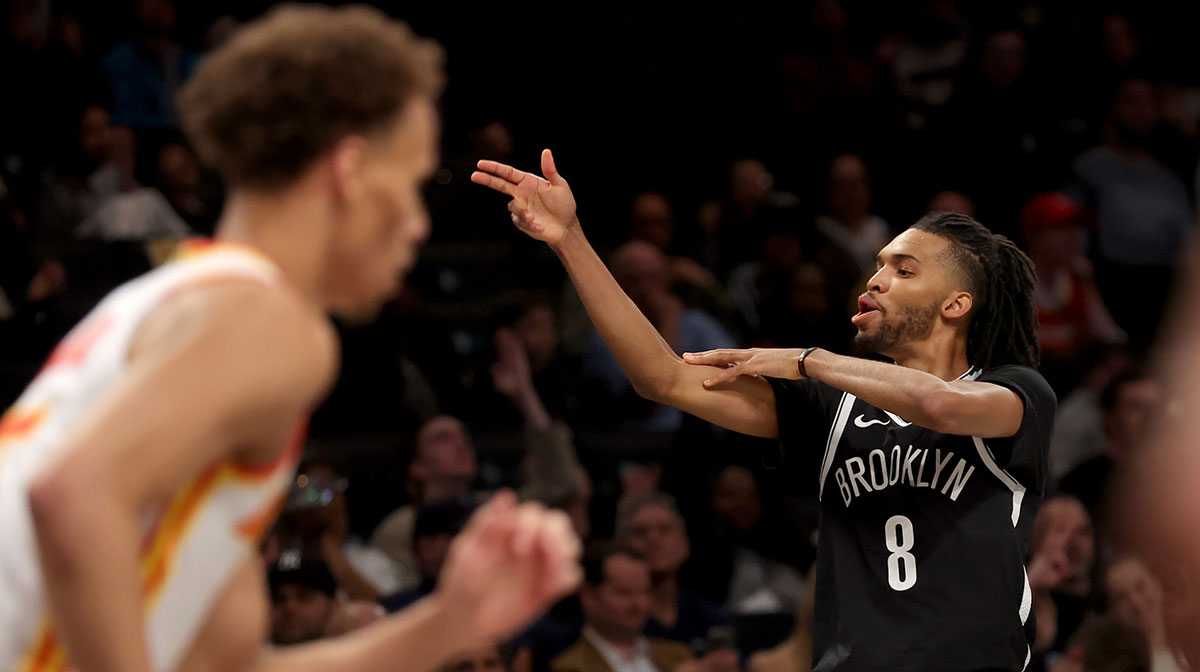 Brooklyn Nets forward Ziaire Williams (8) celebrates his three point shot against the Atlanta Hawks during the first quarter at Barclays Center.