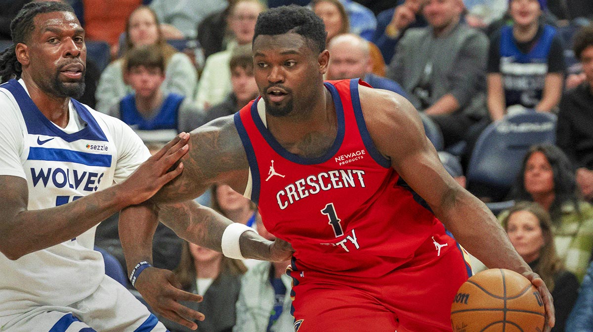 New Orleans Pelicans forward Zion Williamson (1) drives to the basket past Minnesota Timberwolves center Naz Reid (11) in the second half at Target Center.