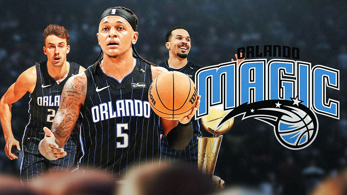 Paolo Banchero, Franz Wagner, Cole Anthony all beside each other, Orlando Magic logo & NBA Larry O'Brien trophy in the background