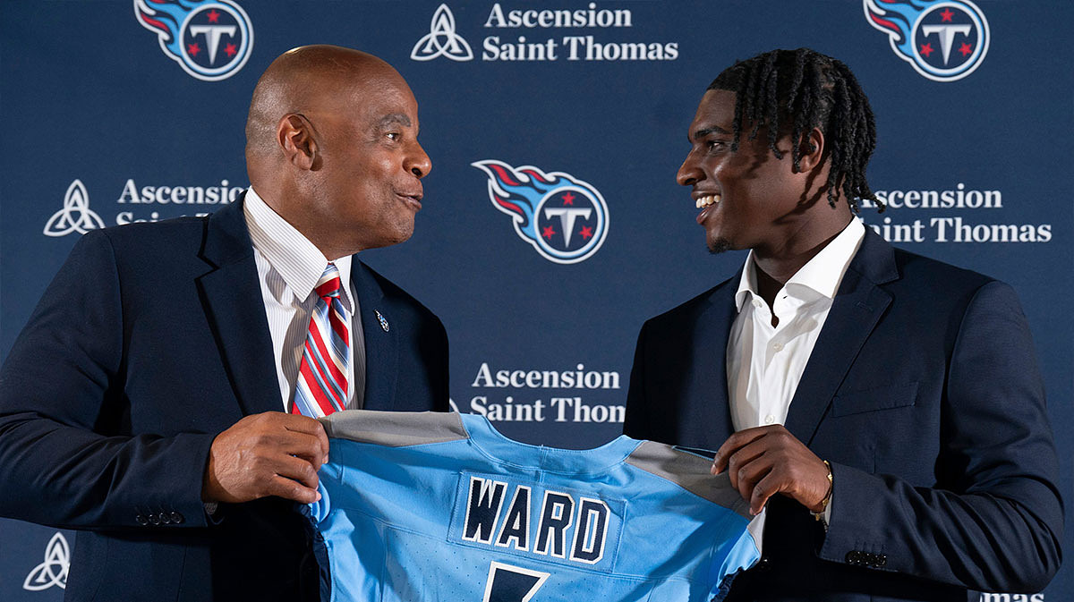 NFL Hall of Fame quarterback Warren Moon, left, poses for pictures with Cam Ward who earlier had been introduced as the Tennessee Titans first-round pick – and overall number one pick – in the NFL Draft at Ascension Saint Thomas Sports Park in Nashville, Tenn., Friday, April 25, 2025. Moon, whose No. 1 jersey is retired for the Tennessee Titans, allowed Ward to wear his number.