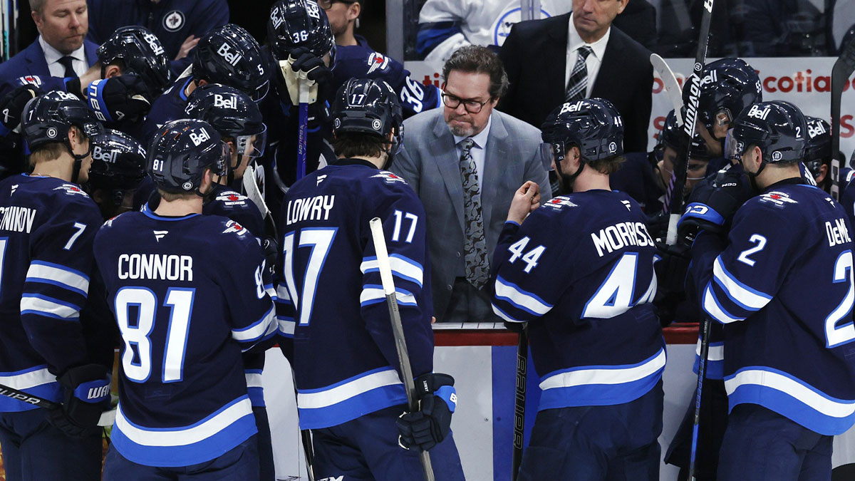 Winnipeg Jets assistant coach Dean Chynoweth talks with players during a time out against the St. Louis Blues in the third period at Canada Life Centre.