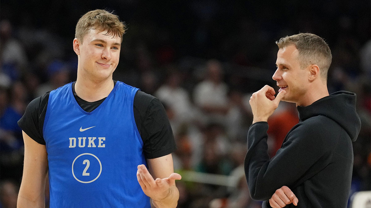 Duke Blue Devils guard Cooper Flagg (2) talks with head coach Jon Scheyer during a practice session for the Final Four of the 2025 NCAA tournament at Alamodome.