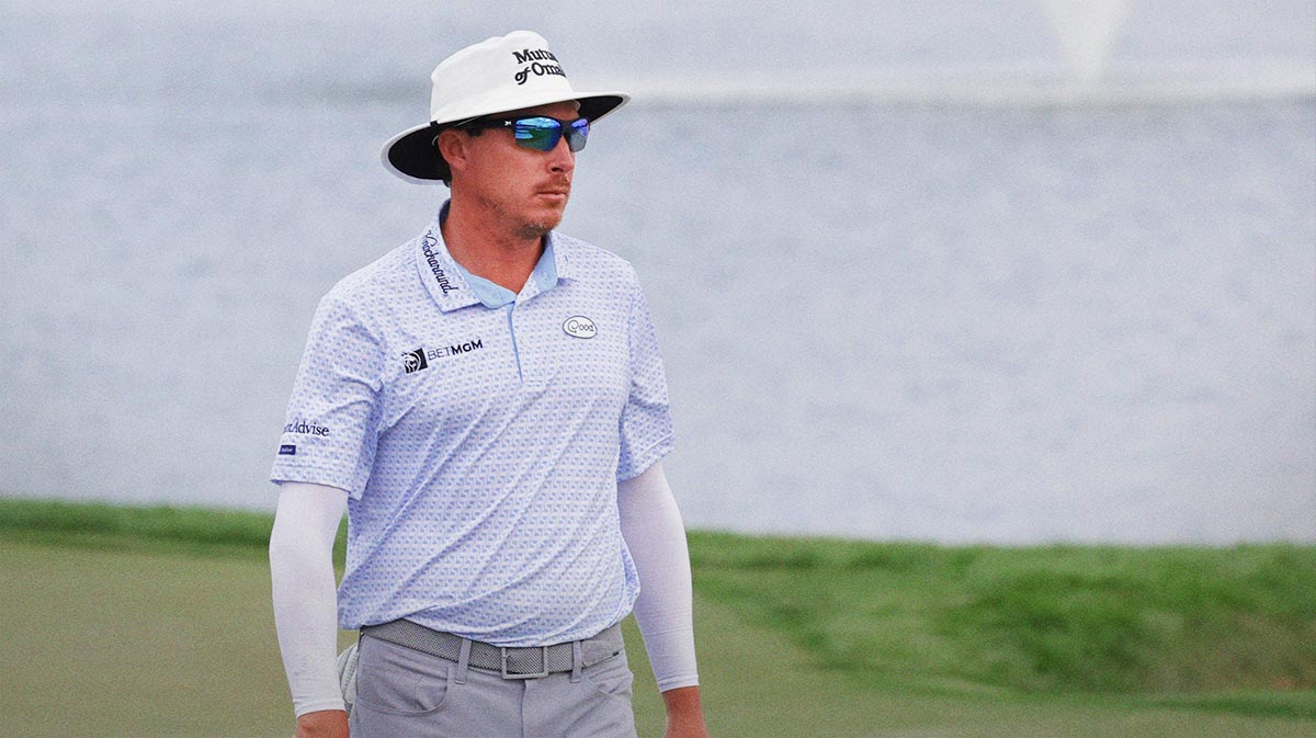 Joel Dahmen walks on the 18th green during the third round of the Cognizant Classic in The Palm Beaches golf tournament