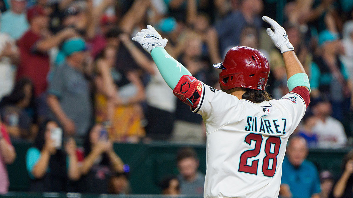 Arizona Diamondbacks infielder Eugenio Suarez (28) reacts after hitting his fourth home run of the game against the Atlanta Braves during the ninth inning at Chase Field.