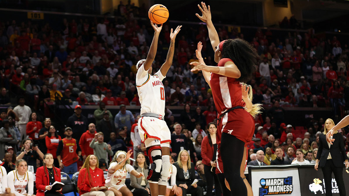 Maryland Terrapins guard Shyanne Sellers (0) takes a shot over multiple Alabama Crimson Tide defenders during the second overtime period at Xfinity Center.
