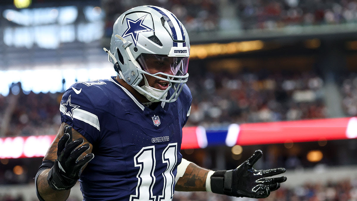 Dallas Cowboys linebacker Micah Parsons (11) celebrates after a sack during the first quarter against the Washington Commanders at AT&T Stadium.