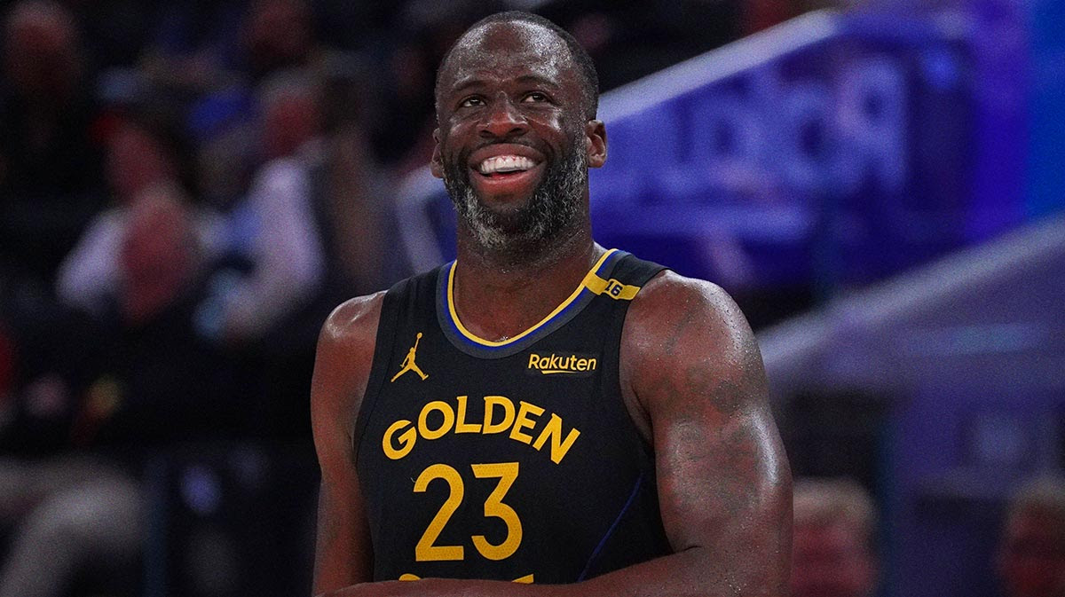 Golden State Warriors forward Draymond Green (23) smiles during a break in the action against the San Antonio Spurs in the third quarter at Chase Center.