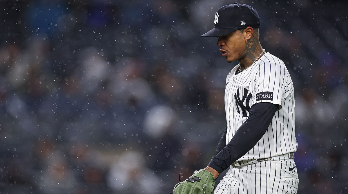 New York Yankees starting pitcher Marcus Stroman (0) walks off after being relieved during the first inning against the San Francisco Giants at Yankee Stadium.