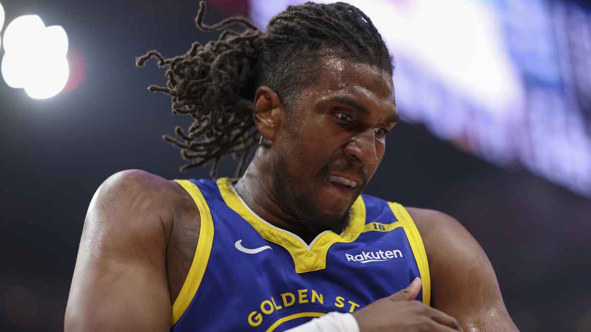 Golden State Warriors forward Kevon Looney (5) reacts after a play during game two of the first round for the 2024 NBA Playoffs against the Houston Rockets at Toyota Center.