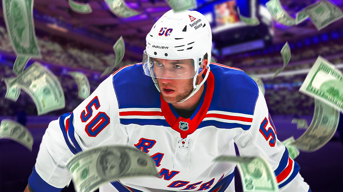 New York Rangers forward Will Cuylle with money raining around him.