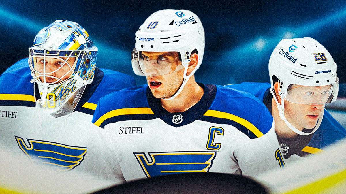 Brayden Schenn in middle, Joel Hofer and Ryan Suter on either side, hockey rink in background