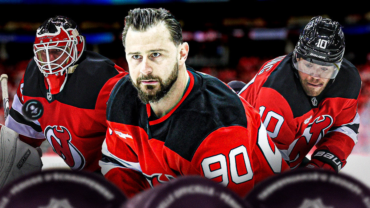 Tomas Tatar, Jake Allen and Daniel Sprong looking stern (all in New Jersey Devils jerseys), hockey rink in background